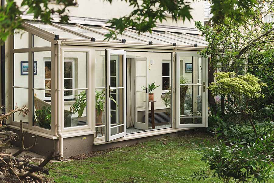 Cream uPVC lean to conservatory with French doors