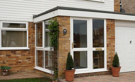 Flat roof porch in white uPVC