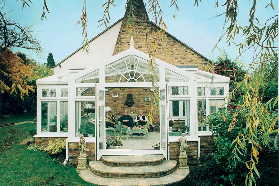 White uPVC T-shaped harmony conservatory front view