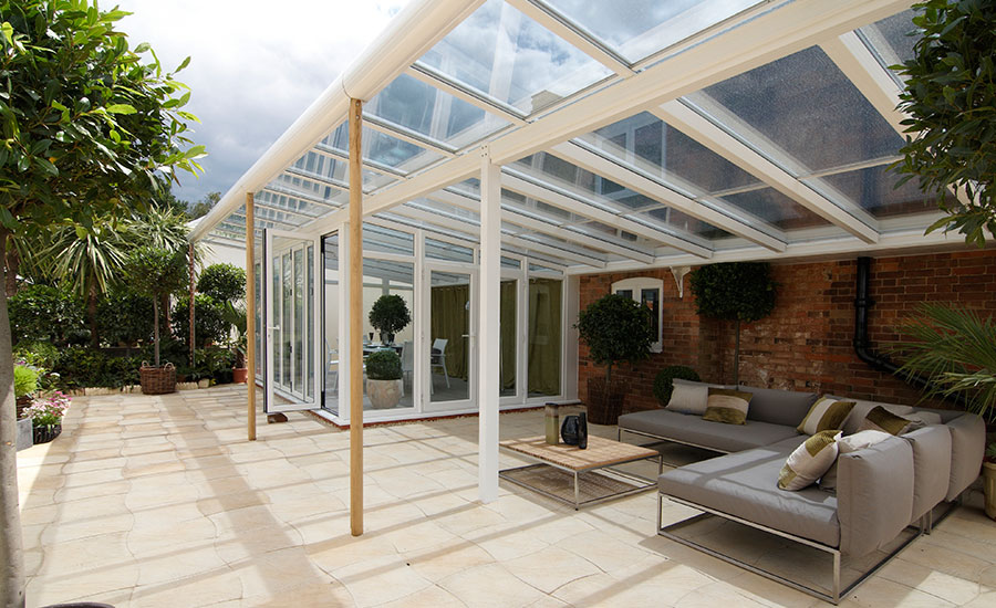 Large uPVC lean to conservatory veranda living space in White from Anglian Home Improvements