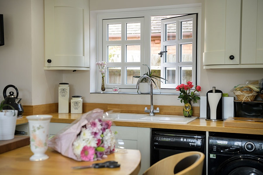 White wooden flush window kitchen interior in open position