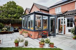 Dual athracite grey Edwardian conservatory with tilt and turn windows