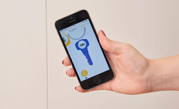 Yale door security mobile application on a front door from Anglian Home Improvements