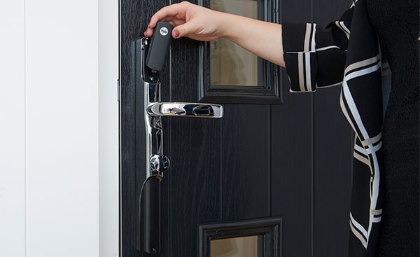 Opening an Anglian front door with the Yale key tag