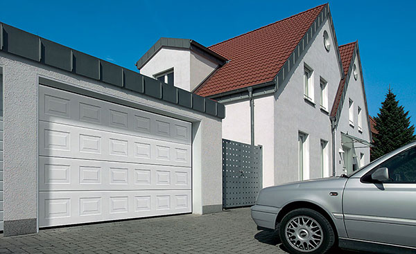 Georgian steel sectional double garage door in White from the Anglian garage door range