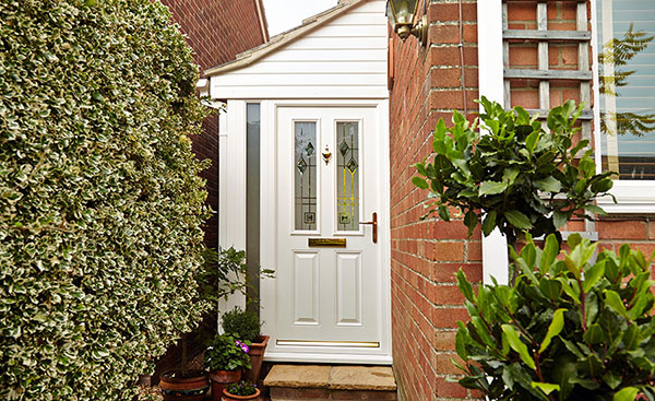 Front door porch with double glazed etched glass and White cladding