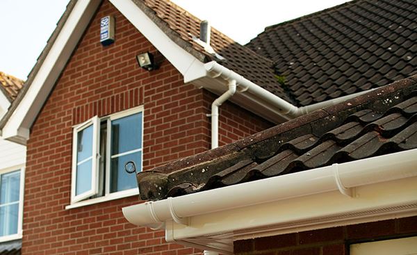 White uPVC gable end bargeboards and guttering from Anglian Home Improvements