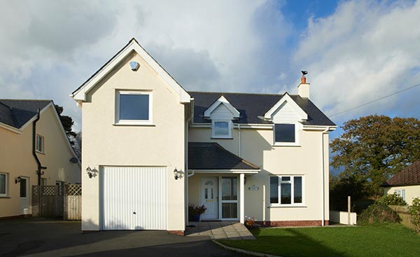 Whole house renovation of white uPVC tripled glazed windows from Anglian Home Improvements