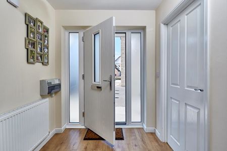 Internal view of contemporary composite front door in white from the Anglian composite doors range