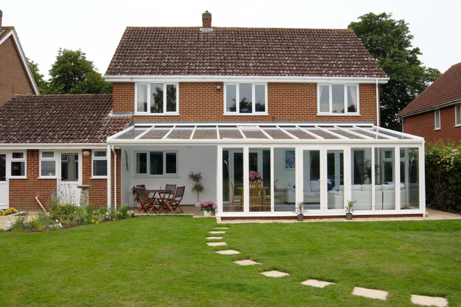 White uPVC Veranda Conservatory Exterior at Back of House