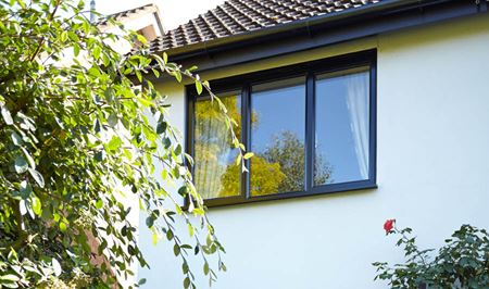 First floor aluminium casement window finished in Jet Black from the Anglian aluminium windows range