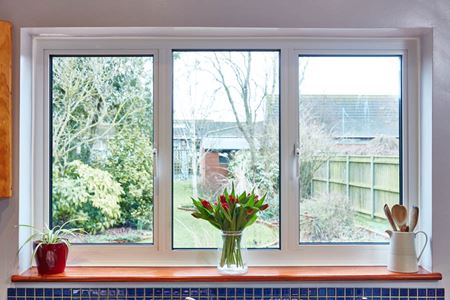 Interior view of White aluminium kitchen window with side hung casement windows from Anglian Home Improvements