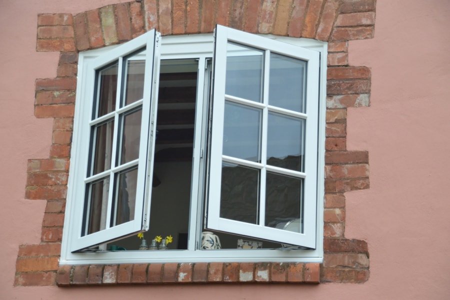 White uPVC Casement Window with Cottage Bars Exterior in Open Position