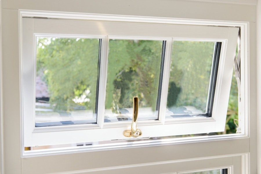 White Wooden Window with Cottage Bars in Open Position Close Up