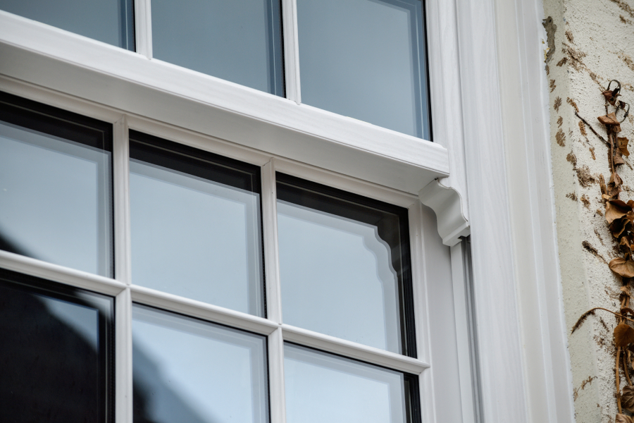 White uPVC Sash Window with Cottage Bars Close Up