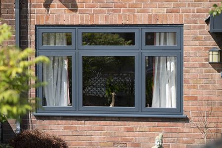 Exterior view of flush uPVC casement window in Anthracite Grey from the Anglian flush window range