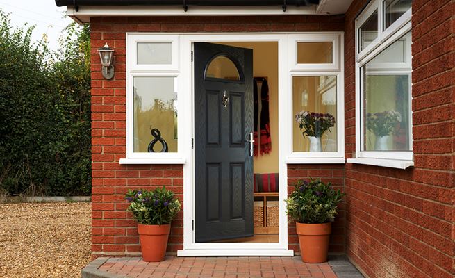 Anthracite Grey composite front door in traditional style with chrome handle and knocker from the Anglian composite doors range
