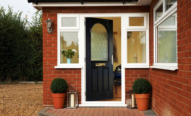 Black half glazed composite front door with Cotswold obscure glass from the Anglian front door range