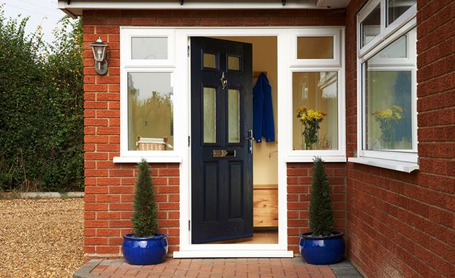 Steel Blue traditional composite front door with chrome handle knocker and letterbox from the Anglian composite doors range