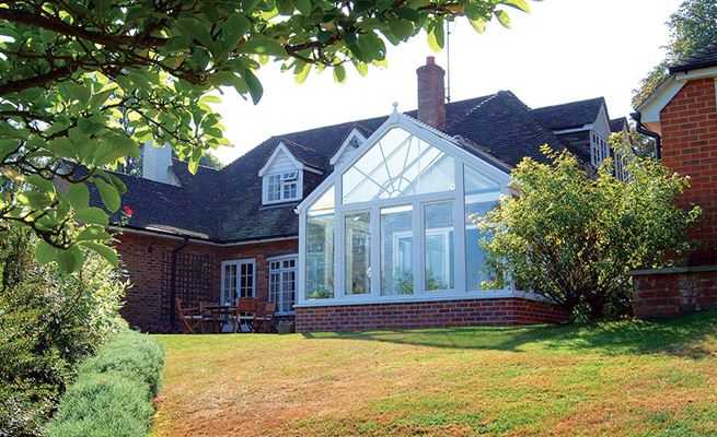 White Knight uPVC Regency conservatory with shaped casement windows from the Anglian classic conservatory range