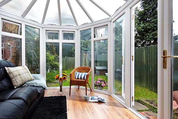 UPVC Victorian conservatory in White Knight with top hung windows and polycarbonate conservatory roof interior view