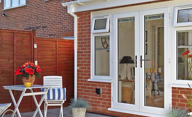 Extension with White Knight uPVC French doors and windows