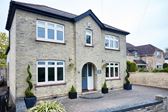 Whole house replacement double glazed UPVC casement windows in Cream from the Anglian double glazing range