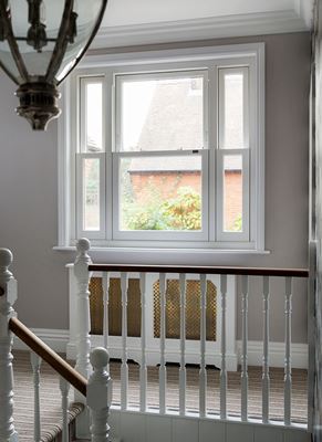 Double glazed White UPVC sash window in upstairs hallway from the Anglian sash window range