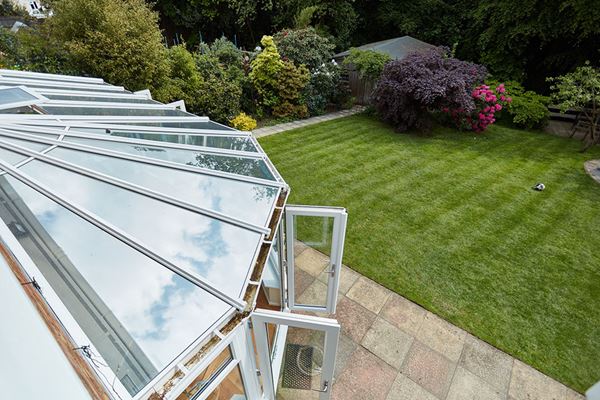 Aerial view of white uPVC lean to Victorian conservatory from the Anglian lean to conservatory range