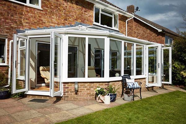 White Knight UPVC Victorian lean to conservatory with two sets of French doors from the Anglian classic conservatory styles 