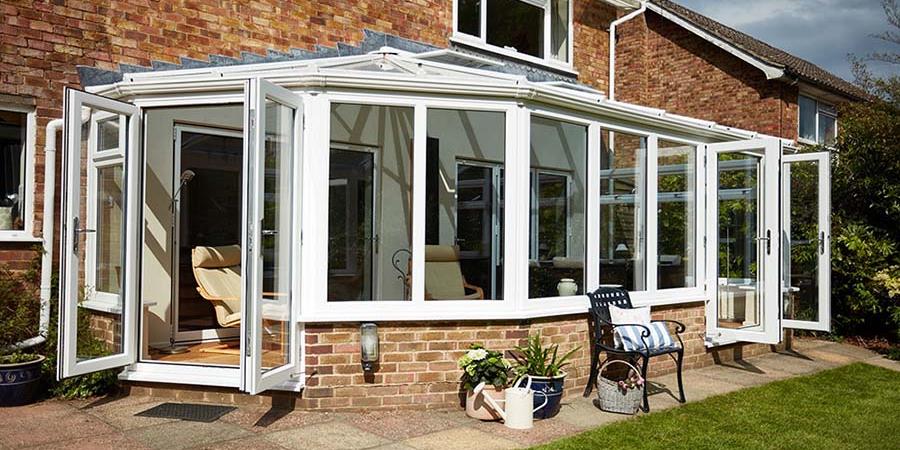 White Knight UPVC Victorian lean to conservatory with two sets of French doors from the Anglian classic conservatory styles 