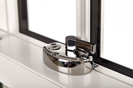 Chrome lock on uPVC classic White Knight sliding sash window