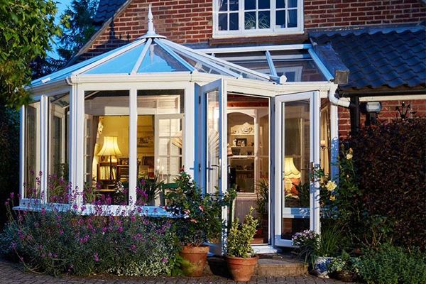 White Knight uPVC Victorian lean to conservatory with uPVC French doors from the Anglian conservatory range