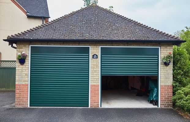 Fir green aluminium roller shutter garage doors from Anglian Home Improvements