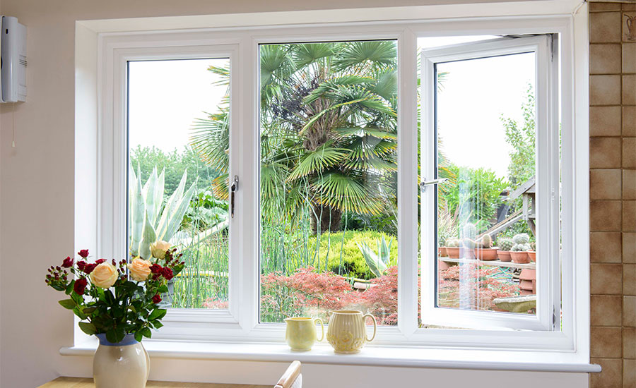 White uPVC side hung casement dining room window design inspiration from Anglian Home Improvements