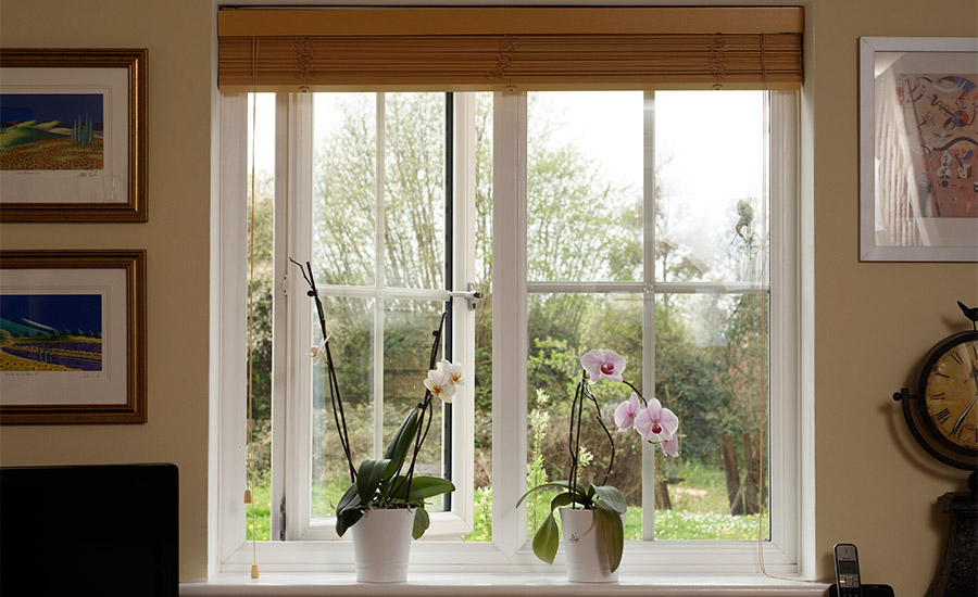 Georgian style dining room window in White uPVC design inspiration from Anglian Home Improvements