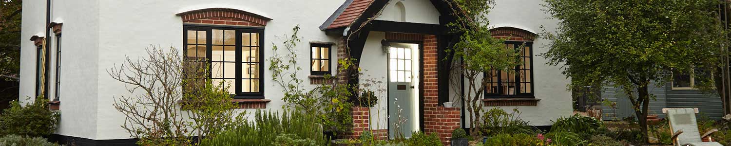 Wooden cottage windows finished in Jet Black