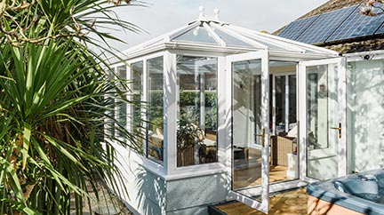 Edwardian UPVC conservatory with French doors from the Anglian classic conservatories range