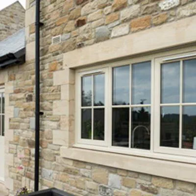 Cream flush casement window product tile from Anglian Home Improvements