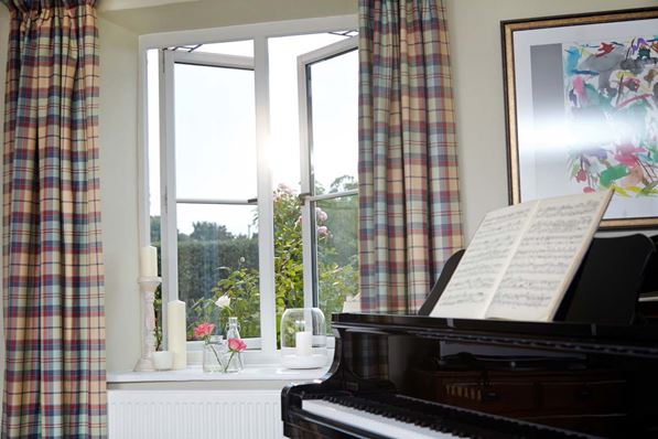 casement-window-with-long-curtains