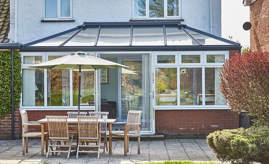 Full panel solid conservatory roof in Anthracite Grey from Anglian Home Improvements