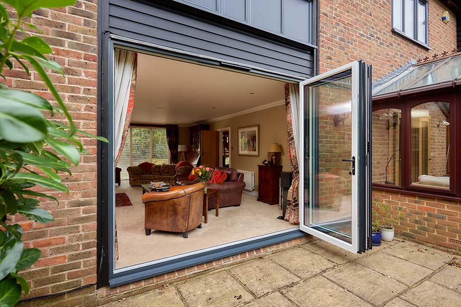 Dual white and Anthracite grey three part bifold door