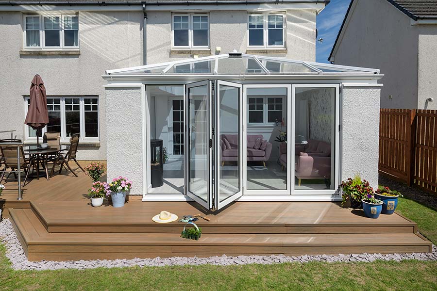 White four panel bifold door on orangery