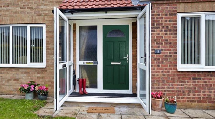 Green coloured composite front door Anglian Home Improvements