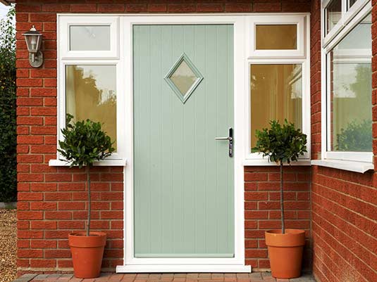 Sage Green coloured composite front door Anglian Home Improvements