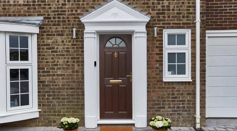 Brown coloured composite front door Anglian Home Improvements