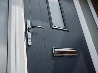Grey composite front door furniture Anglian Home Improvements