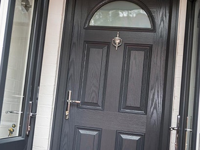 Closeup of woodgrain effect on a composite front door from Anglian Home Improvements