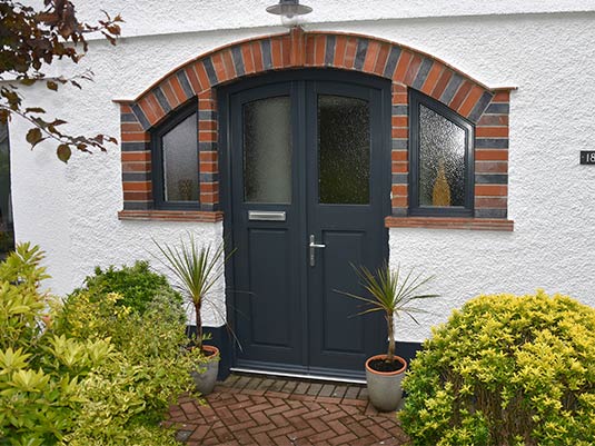 Anthracite Grey wooden front door with side panels Anglian Home UK