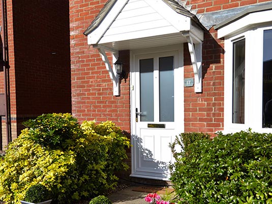 White contemporary uPVC front door from Anglian Home UK